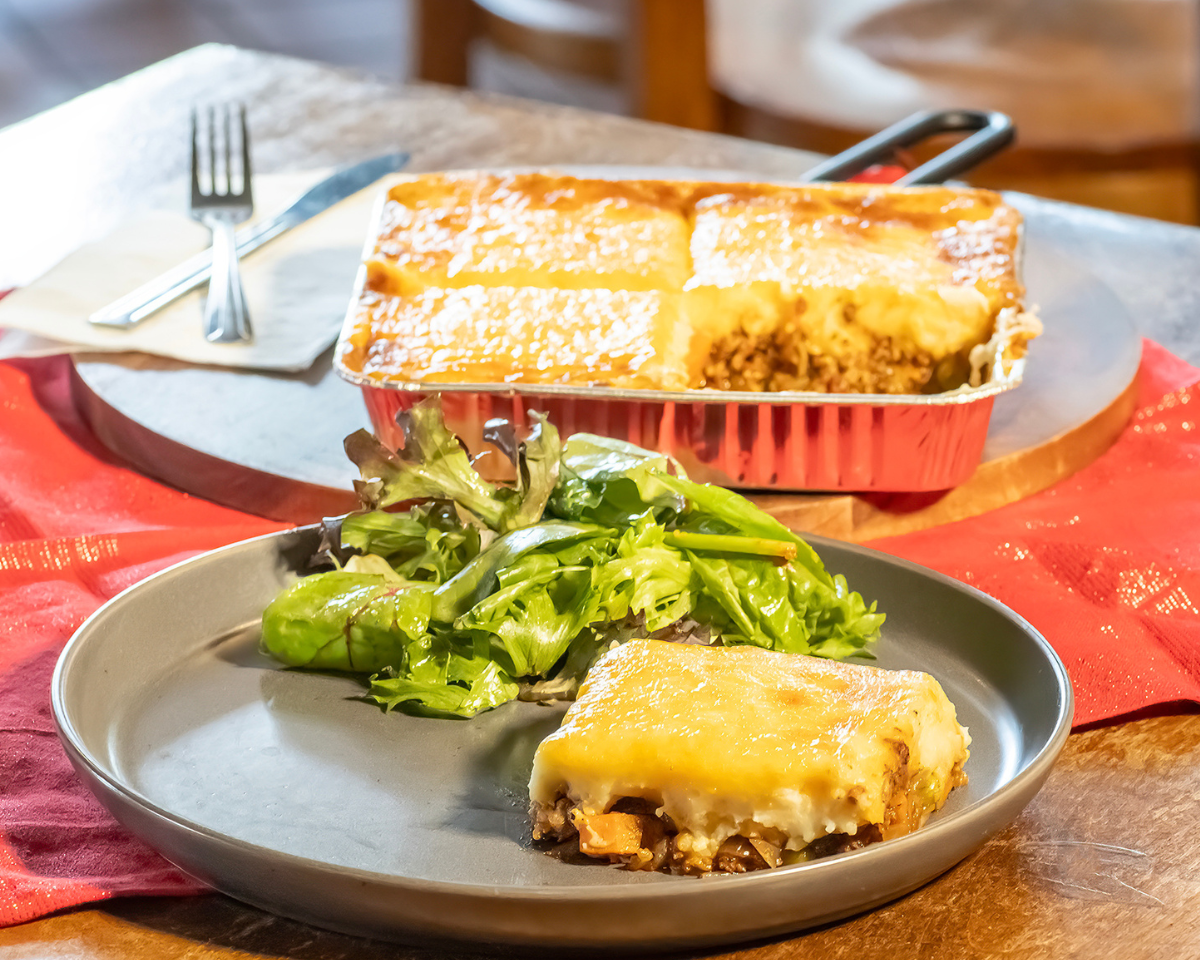 
                  
                    slice of A golden cottage pie ready for eating
                  
                