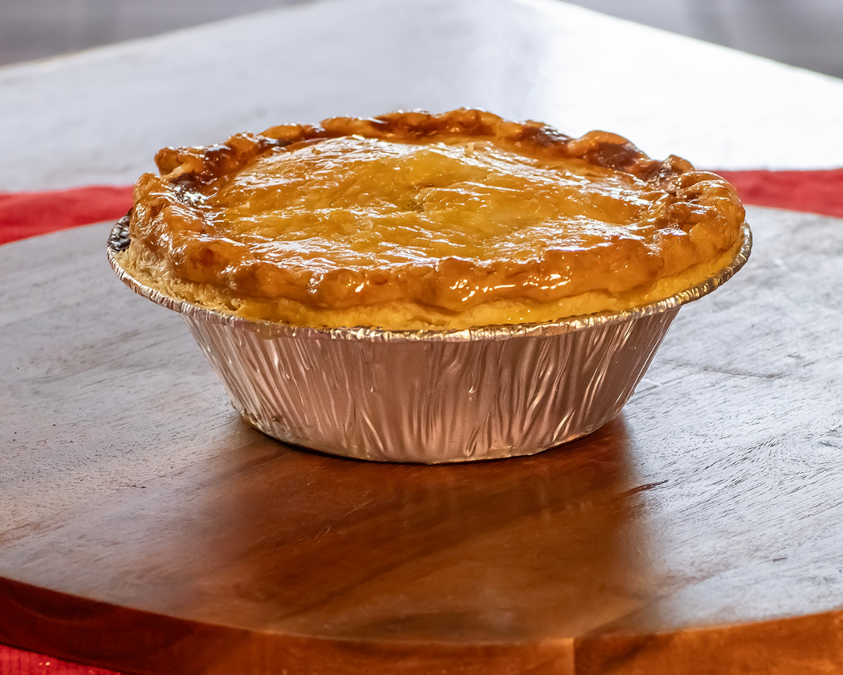 
                  
                    A golden creamy chicken pot pie ready for eating
                  
                