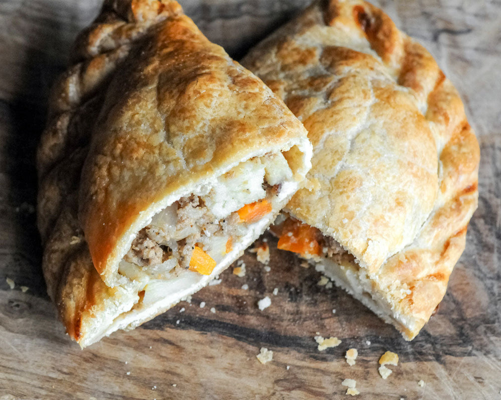  A mini Cornish pasty split open to reveal its filling of beef, potato, onion, carrot, and parsnip